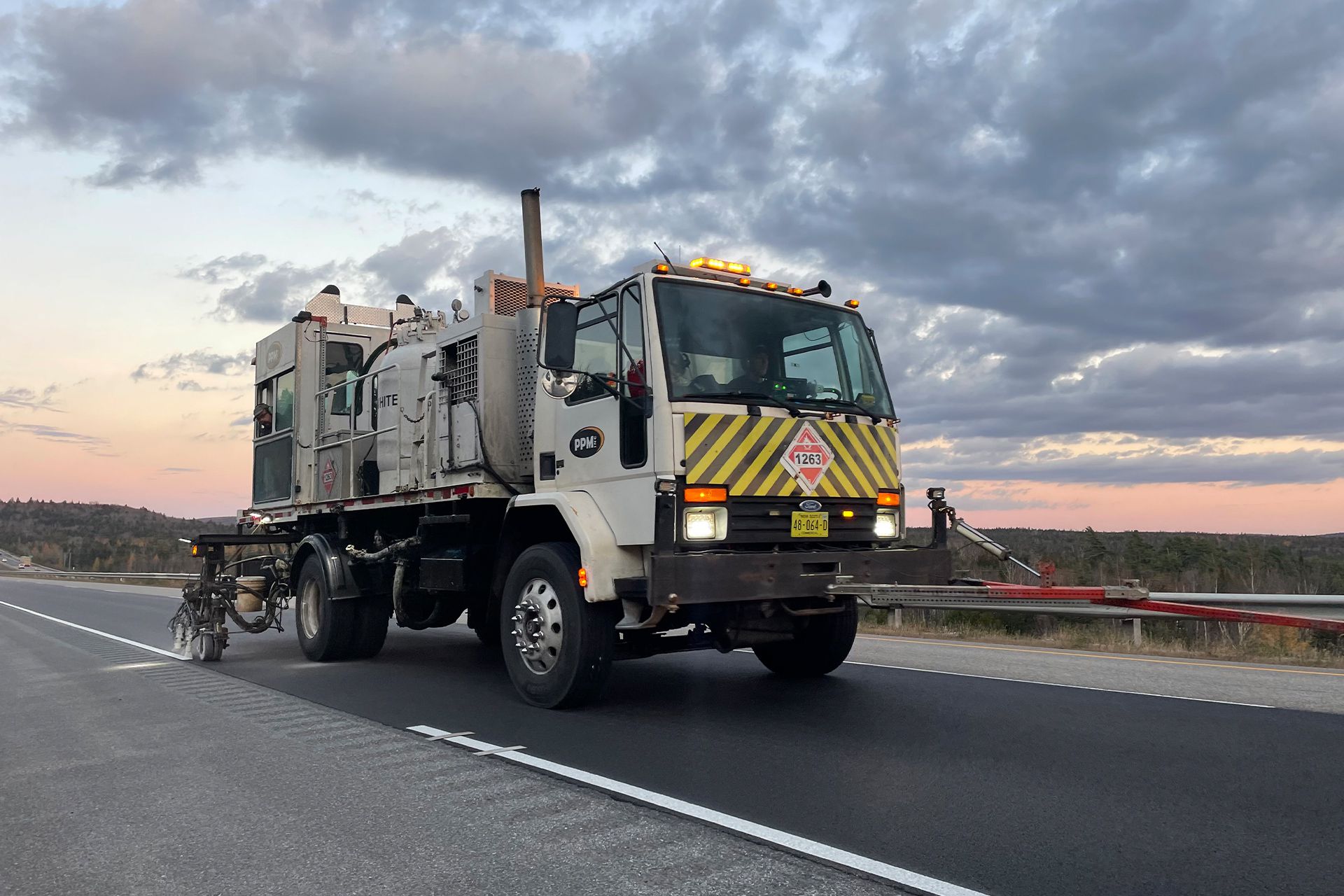 Line Painting Truck on Road