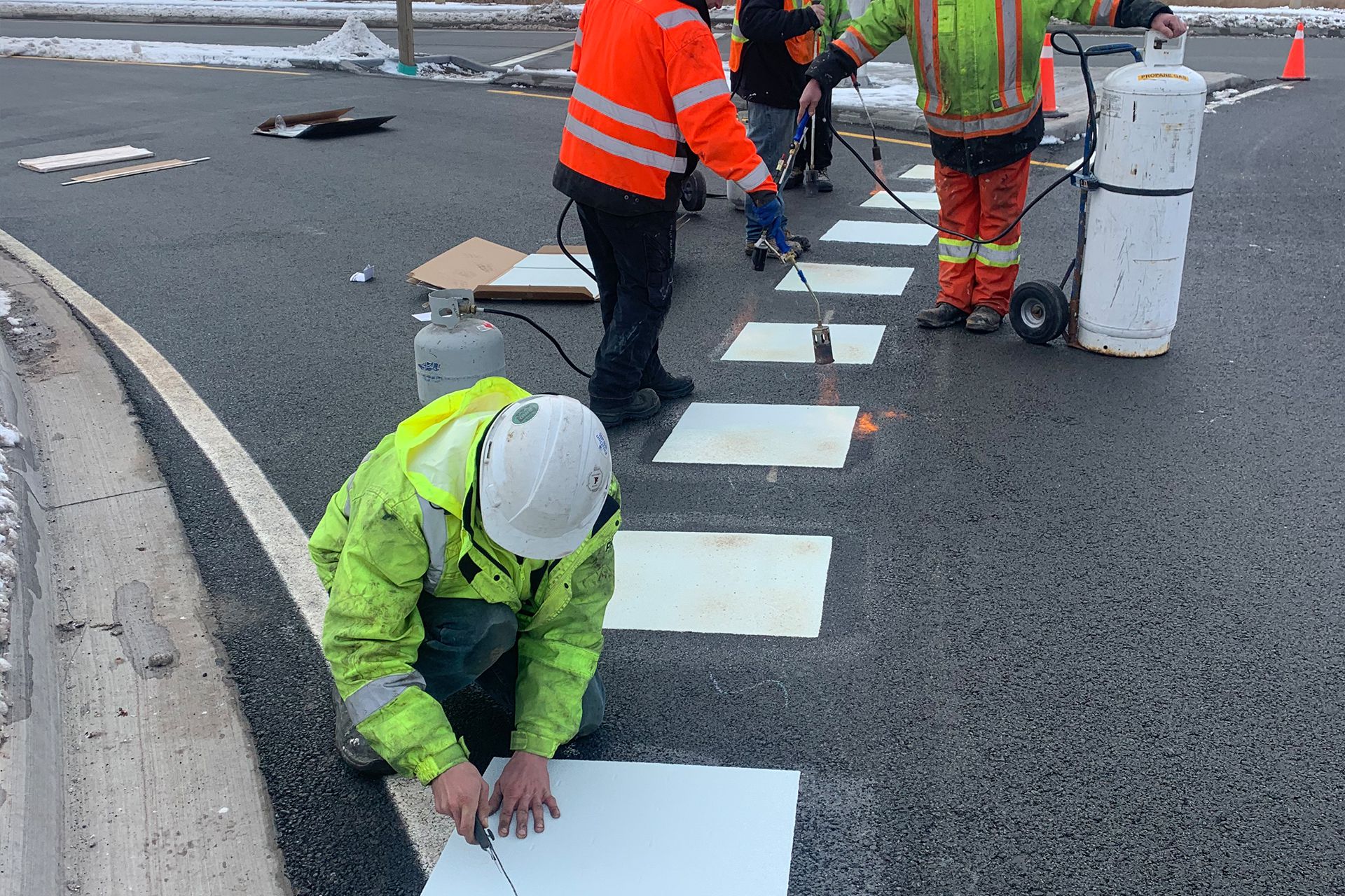 Crew Installing Thermoplastic Markings